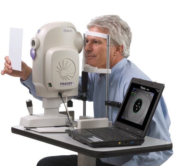 Patient using an iTrace device by Tracey Technologies