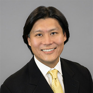 Dr. Ed Hu headshot of Tracey Technologies